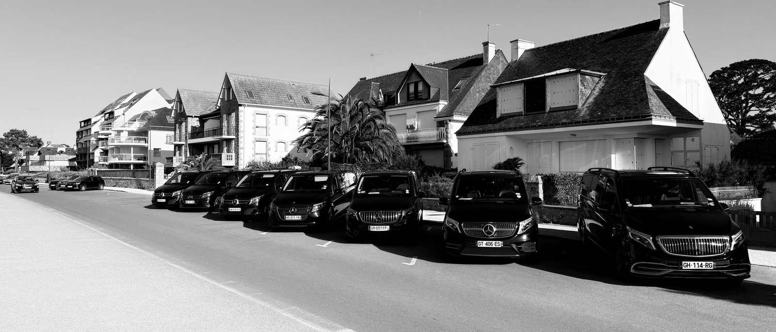 Fleet of Mercedes V-Class vans with private chauffeur for airport and station transfers in Brittany